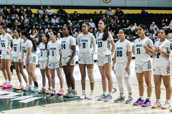 The SHC Girls’ Basketball Team lined up together during last year’s Bruce-Mahoney Basketball Game.